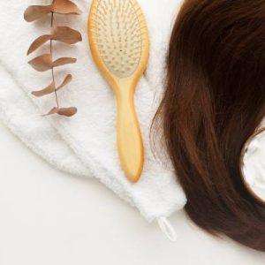 istockphoto-1270654491-612×612 female hair, hair mask and bamboo comb on white background top view, flat lay. copy space. Self care, hair treatment concept.
